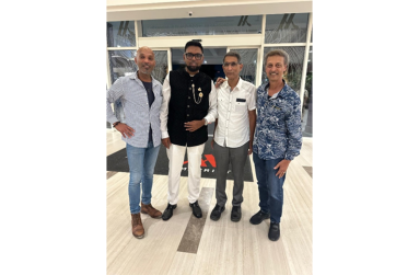 L-R Dr Brian Rambihar, President Irfaan Ali, Dr Vivian Rambihar, and Dr Compton Rambihar at a chance meeting. (Photo: Office of the President Staff)