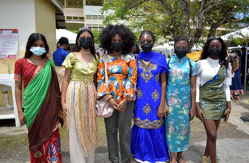 A group of QC students dressed in cultural wear at Friday’s Market Day (Elvin Croker photo)