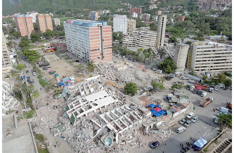 A drone view shows the remains of the apartment building where Maria Alejandra Sanz was trapped after twin earthquakes struck La Guaira, Venezuela, July 4, 2026 (REUTERS/Ricardo Arduengo)