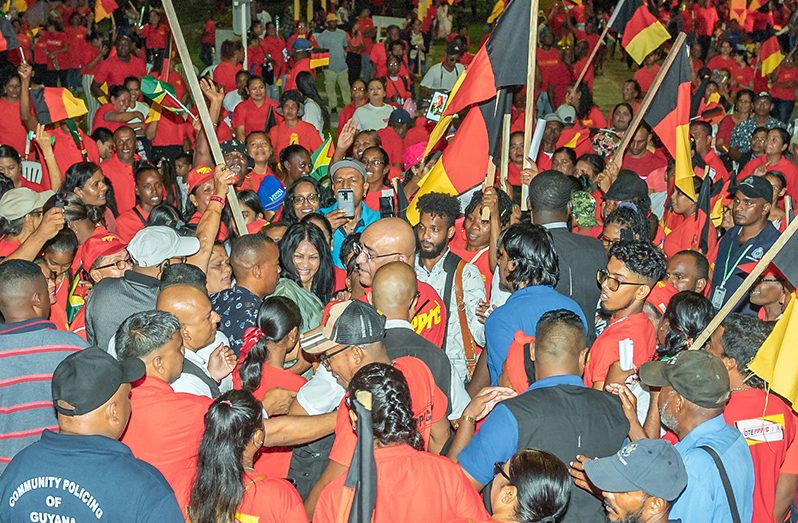 PPP/C General Secretary, Dr. Bharrat Jagdeo interacts with supporters during Friday’s rally (Delano Williams photo)