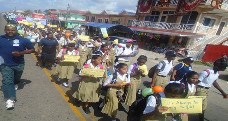 Schoolchildren at the walk and rally organised by the New Jersey Arya Samaj Humanitarian Mission, the Public Health Ministry and several other organisations (Nafeeza Yahya photo)
