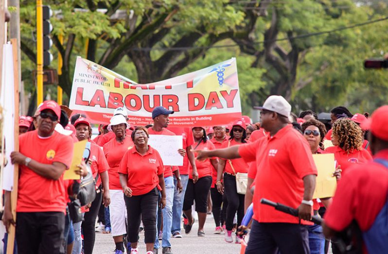 Workers during a Labour Day rally in Georgetown
