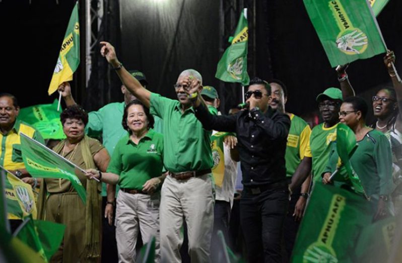 Reigning Chutney Soca Monarch, Stephen Ramphal, photographed on stage with President David Granger and other party members at the APNU+AFC campaign launch, emphasises that he is not politically aligned (Delano Williams photo)