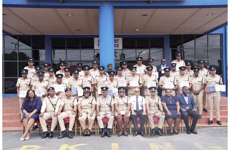 Graduates of the Junior Officers’ Course and Immigration Course with senior officers (seated) at the Police Officers’ Training Centre, Eve Leary, Georgetown