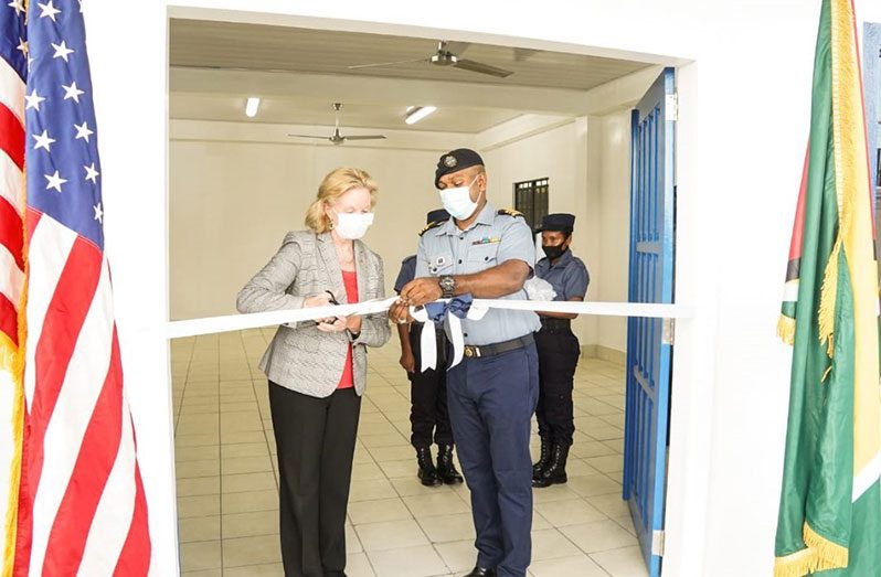 US Ambassador Sarah-Ann Lynch and acting Commander, Coast Guard, Lieutenant Commander, David Shamsudeen cut the ribbon, symbolising the official handing over of the renovated facility