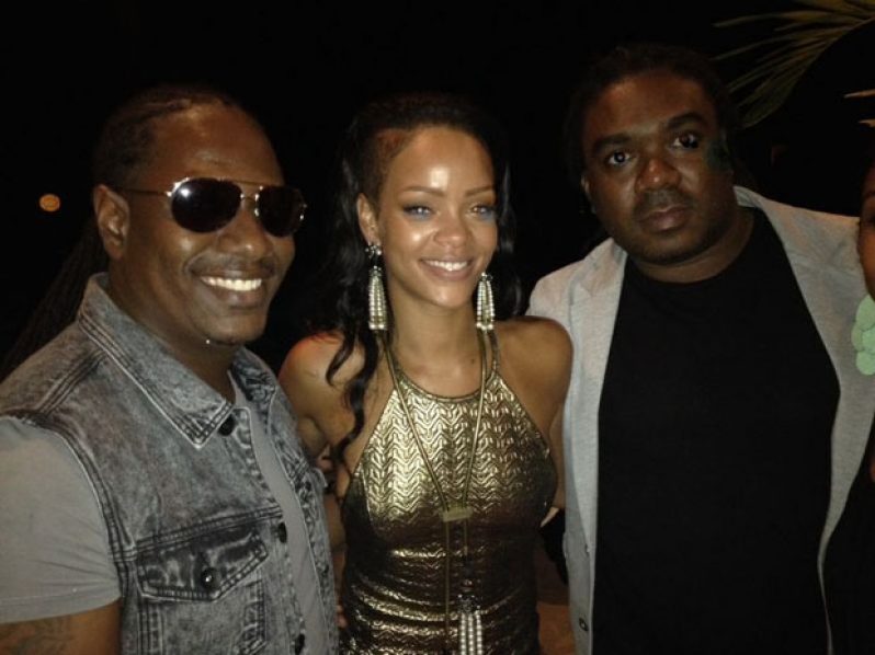 Seen here with Rihanna (centre) are Kerwin Bollers (left)  and Rawle Ferguson