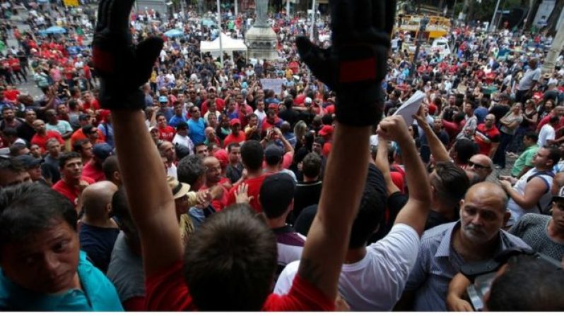 Many of the protesters were police men and firemen who hadn't been paid in months.