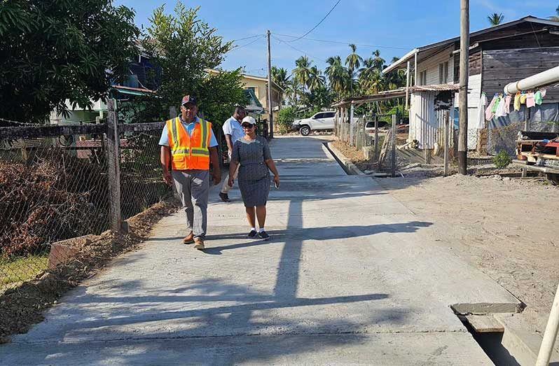 Regional Executive Officer (REO) of Region Two, Susanah Saywack inspecting a road project