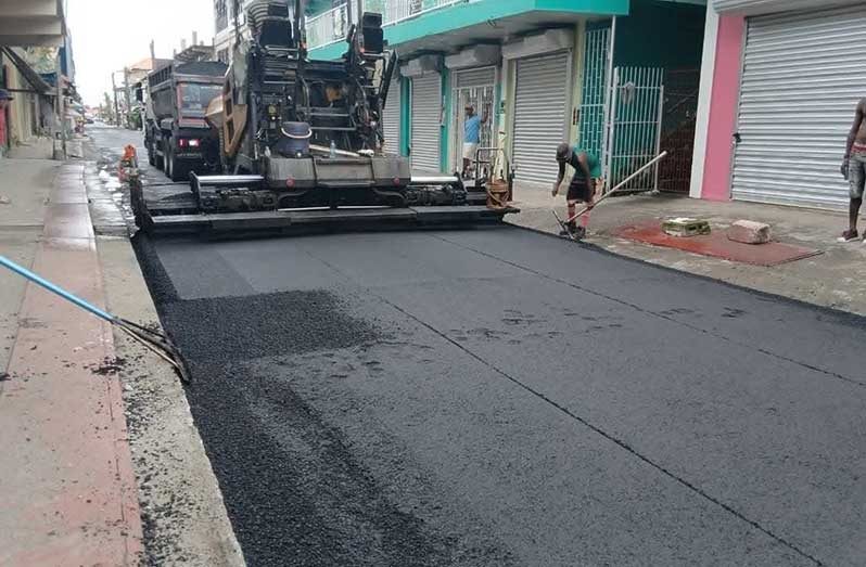 Minister within the Ministry of Public Works Madanlall Ramraj, along with regional representatives, recently visited Pitt Street, in New Amsterdam, to assess concerns raised by residents, business owners, and motorists regarding the deteriorating condition of the roadway.
Following the assessment, works were immediately mobilised to commence resurfacing the important thoroughfare.
Pitt Street serves as a key commercial artery in New Amsterdam, supporting businesses, facilitating transportation, and contributing to economic activity within the region (Photos: Vice-President Bharrat Jagdeo/Facebook)