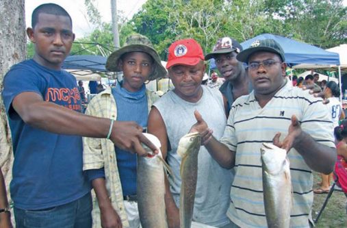 This group display their catch after the fish-catching competition