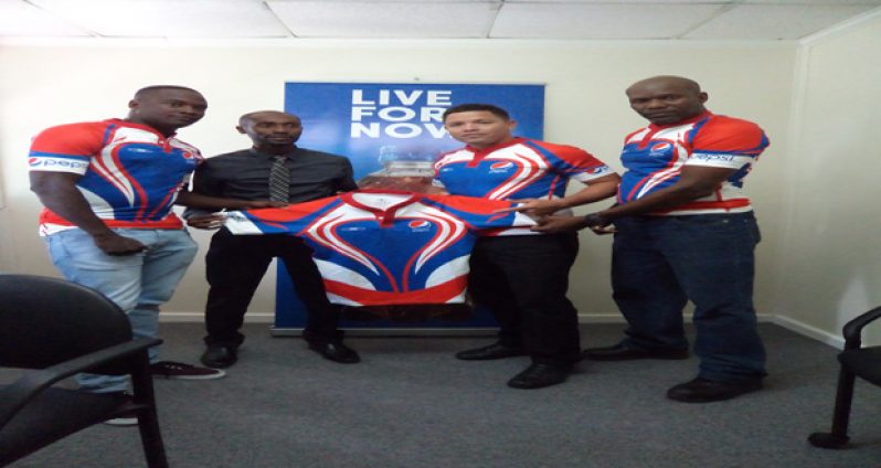 Left to right: Blaise Bailey, Larry Wills, Ryan Gonsalves and Kenneth Grant-Stuart pose with outfits.