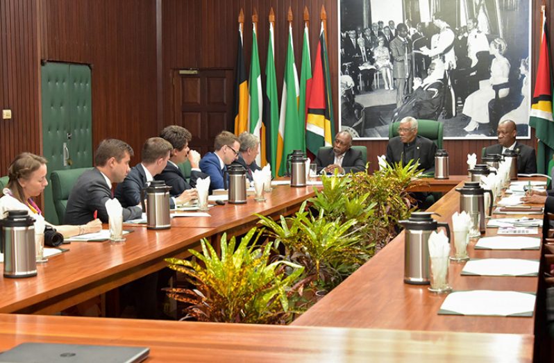 President David Granger, Foreign Affairs Minister, Carl Greenidge and Minister of State, Joseph Harmon in discussion with the Russian delegation