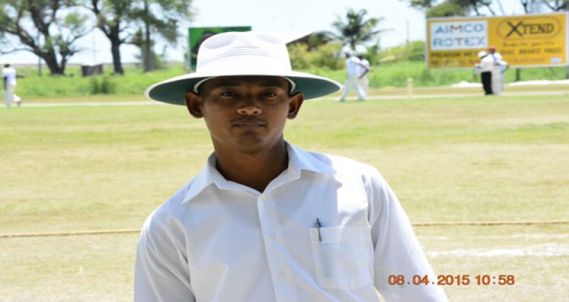 Umpire Ryan Banwarie on the field