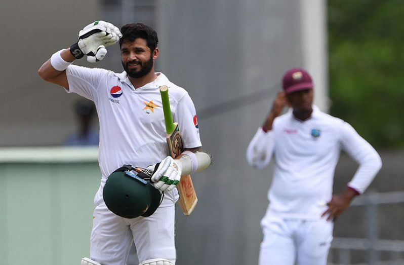 Azhar Ali does the salute again after reaching his 14th Test century, in Dominica.
