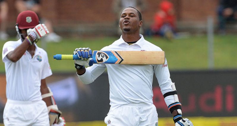 Marlon Samuels celebrates reaching his sixth Test hundred against South Africa