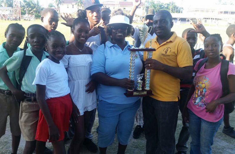 Some of the Lodge Secondary teachers and students celebrate their win.