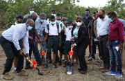 Minister of Education, Priya Manickchand (right, holding spade) along with her PS, Alfred King (left), and Chief Education Officer, Dr. Marcel Hutson (with fork) doing the symbolic turning of the sod at the site of the new Prospect Secondary School on Thursday (Elvin Croker photo)