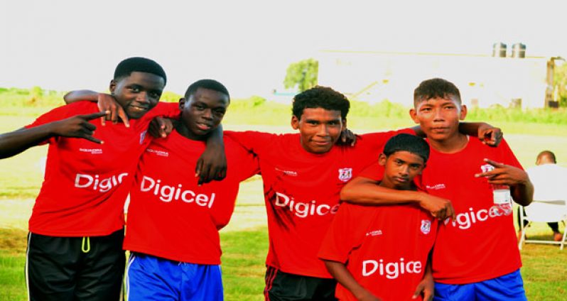 Cummings Lodge strike pose after demolishing Nehemiah Secondary 7-2 yesterday. (Adrian Narine photo)