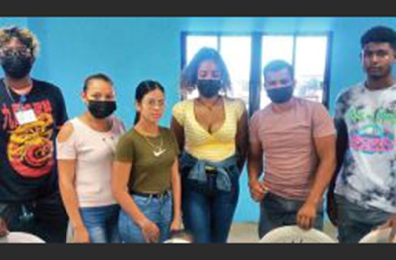 Marcia Seeram (third from right) along with the other executive members of A.K. Galaxy Football Club