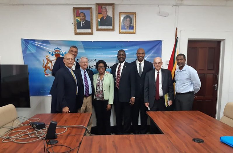 Minister of Public Infrastructure, Catherine Hughes (centre), Senator Richard Black (third from left) and Mayor of Purcellville, Virginia, Kwasi Fraser (fourth from right) flanked by other U.S. officials