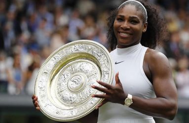 USA's Serena Williams celebrates winning her womens singles final match against Germany's Angelique Kerber with the trophy 
Reuters/Toby Melville