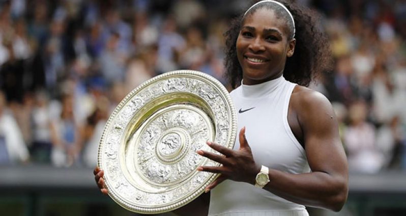 USA's Serena Williams celebrates winning her womens singles final match against Germany's Angelique Kerber with the trophy 
Reuters/Toby Melville