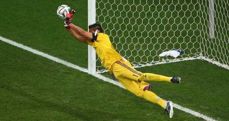 Sergio Romero of Argentina reacts after saving the penalty kick of Wesley Sneijder (not pictured) in a shootout during the 2014 FIFA World Cup Brazil Semi Final match between the Netherlands and Argentina at Arena de Sao Paulo yesterday in Sao Paulo, Brazil. (Photo by Julian Finney/Getty Images)