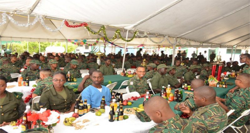 Soldiers being feted yesterday at a Christmas luncheon at Base Camp Stephenson