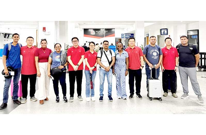 Members of the 20th China Medical Team for Guyana and the China-bound Guyanese doctors at the CJIA