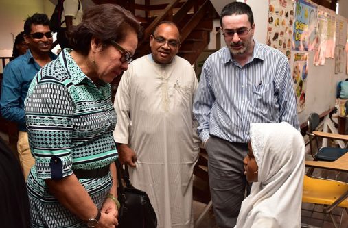 shoes2 First Lady, Mrs. Sandra Granger listens as Ms. Meira Kaia James warmly welcomes her to her Grade One classroom as, first and second from right, Sheikh Mooen-ul-Hack, Director of Education and Dawah at the CIOG and Mr. Fazil Hakh, a member of the CIOG looks on.