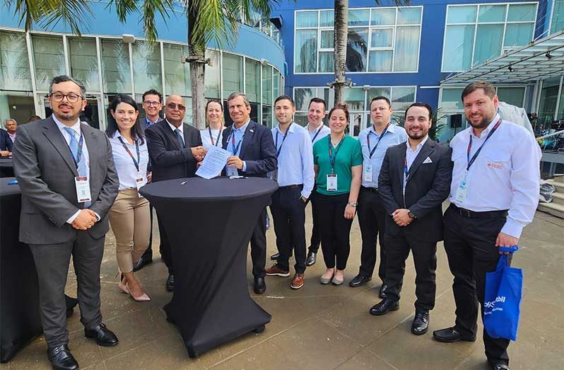 Manniram Prashad, President of the Guyana Oil and Gas Energy Chamber (GOGEC) and Nelson Castañeda Barbour, Executive President of the Colombian Petroleum, Gas and Energy Chamber (CAMPETROL) hold the signed MoU which will foster collaboration in the oil, gas and energy sectors