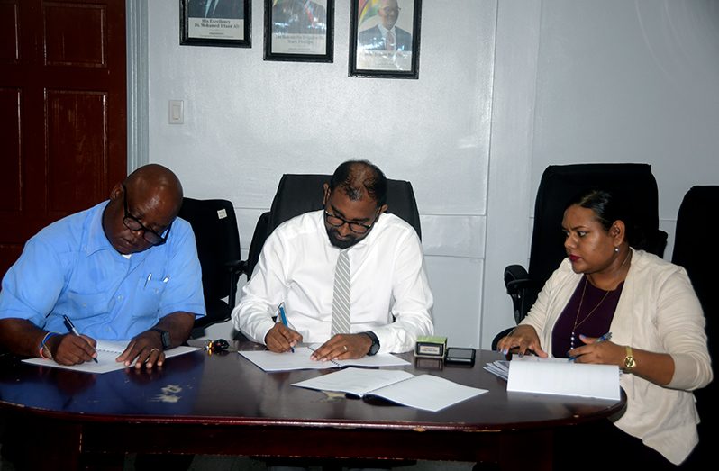 From left to right: CCWU President Sherwood Clarke, Chief Labour Officer, Dhaneshwar Deonarine and CJIA Director of Finance and Administration, Ishwari Glasgow