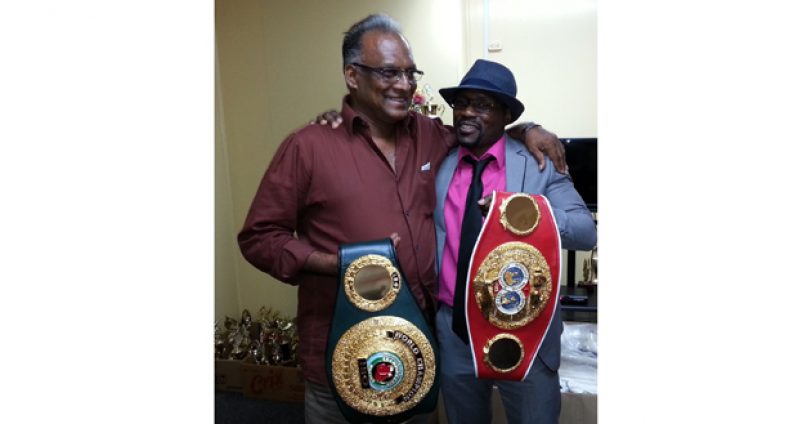 Congrats Gairy! Keep the flag flying high. These were the words uttered to two-time world boxing champion Gairy St Clair (right) who paid a courtesy call on Director of Sport Neil Kumar at his Middle Street office last Wednesday.