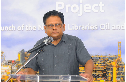 Senior Minister in the Office of the President with Responsibility for Finance Dr. Ashni Singh speaking at the launch of the Oil and Gas Corner at the New Amsterdam National Library in Region Six