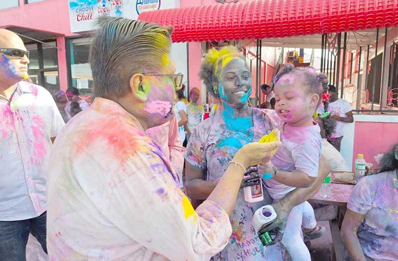 Dr Ashni Singh shares in the vibrant spirit of Phagwah with residents of Region Six, celebrating unity, culture, and the joy of togetherness as colours filled the air