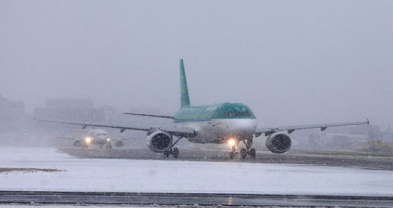 Aircraft on snow-filled runway