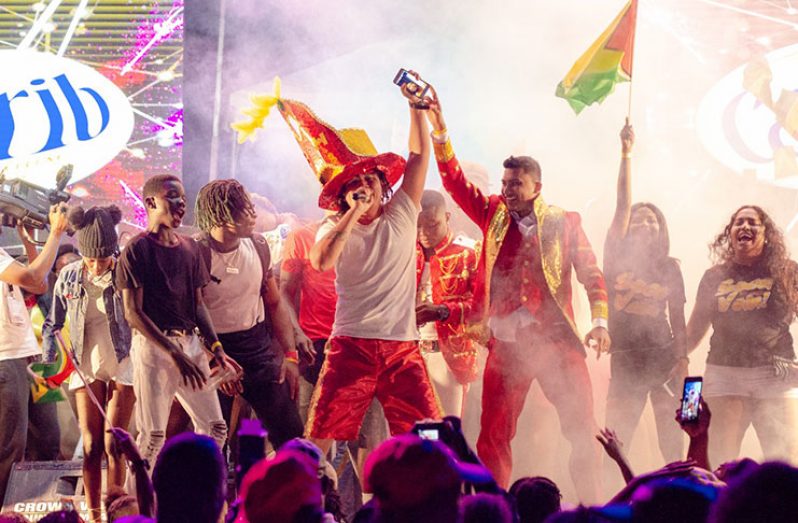 Carib Soca Monarch, 2019 champion Brandon Harding (left) and second-place finisher Stephen Ramphal celebrate their wins in the competition (Delano Williams photo)