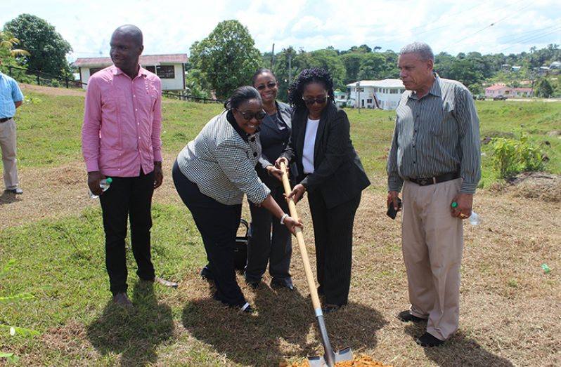 Women Power! Chancellor of the Judiciary (ag) Justice Yonette Cummings-Edwards, assisted by Chief Magistrate, Ann McLennan and Chief Justice (ag) Roxane George-Wiltshire, turn the sod for the new Magistrate’s Court in the presence of Bartica Mayor, Gifford Marshall (left) and Region Seven Chairman, Gordon Bradford