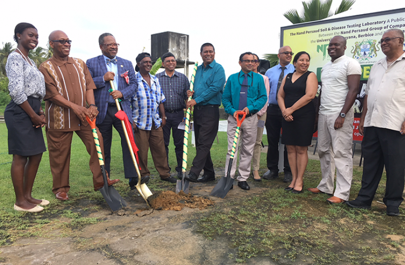 Vice Chancellor University of Guyana Professor Ivelaw Griffith (third from left) Chairman Nand Persaud Group of Companies Rajendra Persaud(fifth from left) CEO Nand Persaud and Company Limited Mohin Persaud (sixth from left) Director UGBC Professor Gomathinayagam Subramanian; Deputy Vice Chancellor PACE Dr. Paloma Mohamed (third from right) along with farmers, student, members of the business community and staff of UGBC partake in the symbolic turning of the sod