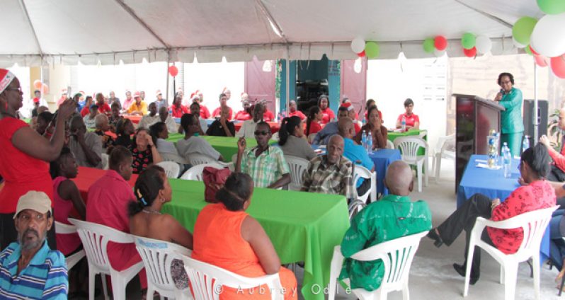 Minister of Social Protection, Volda Lawrence, addressing residents of the Night Shelter on the jolly occasion