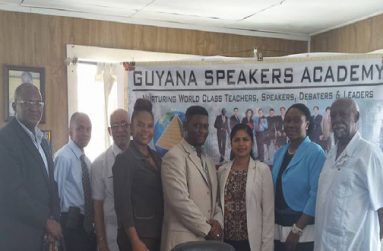 Gary Thompson (centre) with team members of the Guyana Speakers and Leadership Academy