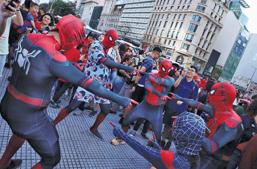 People dressed as Spider-Man point at each other at a Spider-Man cosplayers' gathering, organised in an attempt to set a Guinness World Record for the largest gathering of people dressed as Spider-Man, in Buenos Aires, Argentina on October 29, 2023 (REUTERS/Cristina Sille)