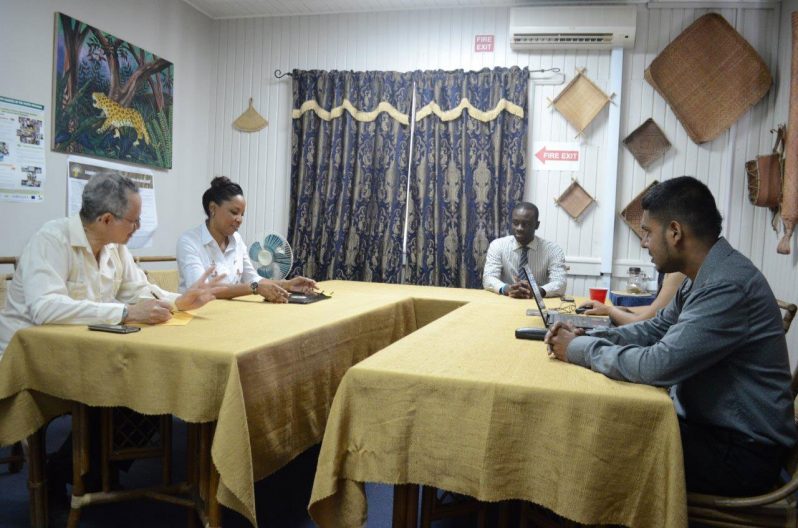 ACP Secretary-General Dr Patrick Gomes in discussion with senior Iwokrama staffers