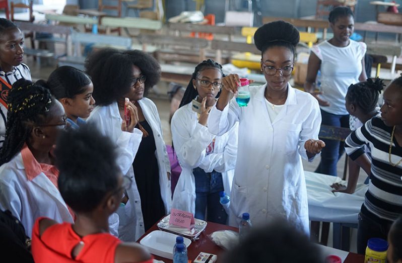 Joylyn Conway and the participants of the camp conducting a scientific experiment (Joylyn Conway photo)