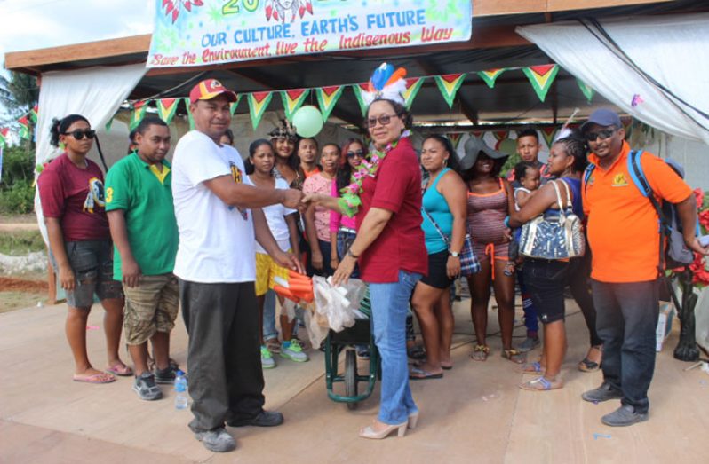 Minister within the Ministry of Indigenous Peoples’ Affairs, Valerie Garrido-Lowe, handed over some farming tools to residents of Hururu during a recent visit to that Region 10 village