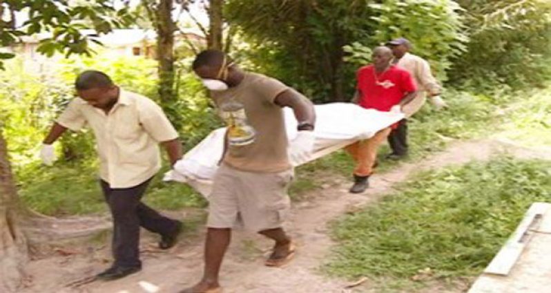 The body of Remington being removed from the scene