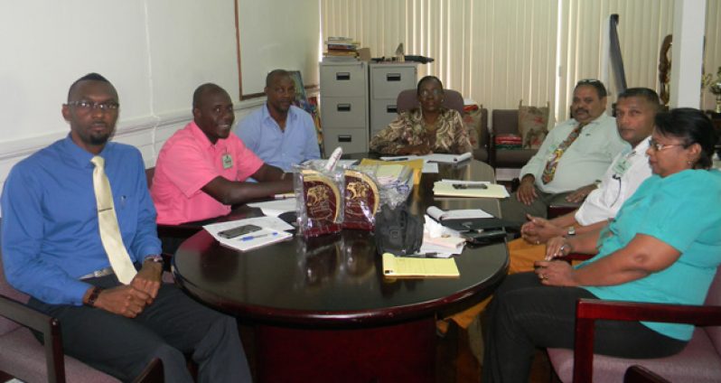 The GoG and GCB delegations at the meeting - Minister Nicolette Henry is sitting at the head table.
