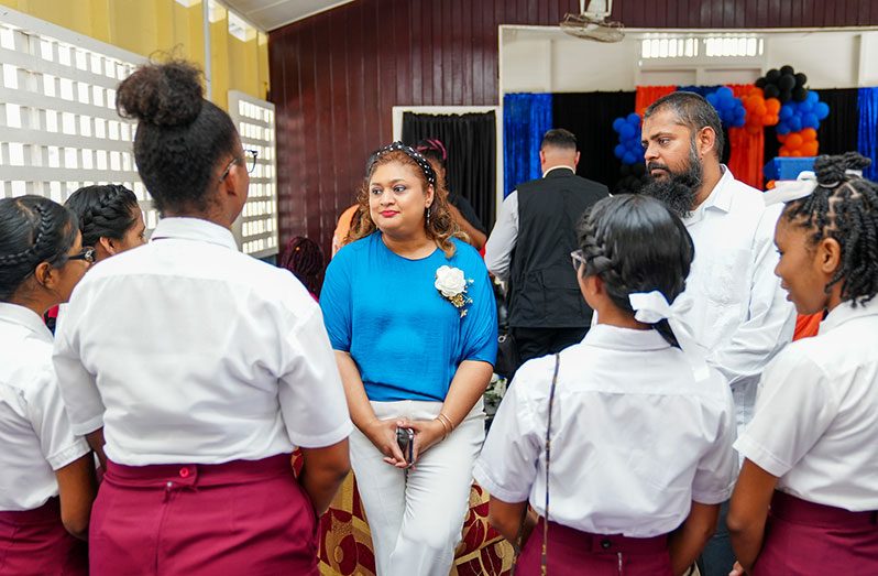 Minister of Education, Priya Manickchand along with Chief Education Officer, Saddam Hussain speaking to the first batch of CAPE students