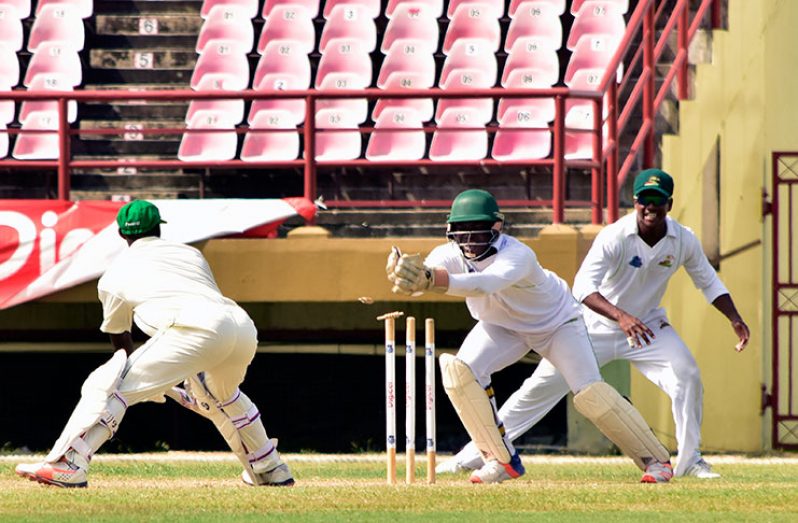 Jamaica batsman Devon Thomas is smartly stumped by wicketkeeper Anthony Bramble off the bowling  leg-spinner Gudakesh Motie (Adrian Narine photo).