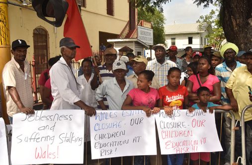 Employees from the Wales and Enmore Estates in protest outside the Public Buildings on Monday